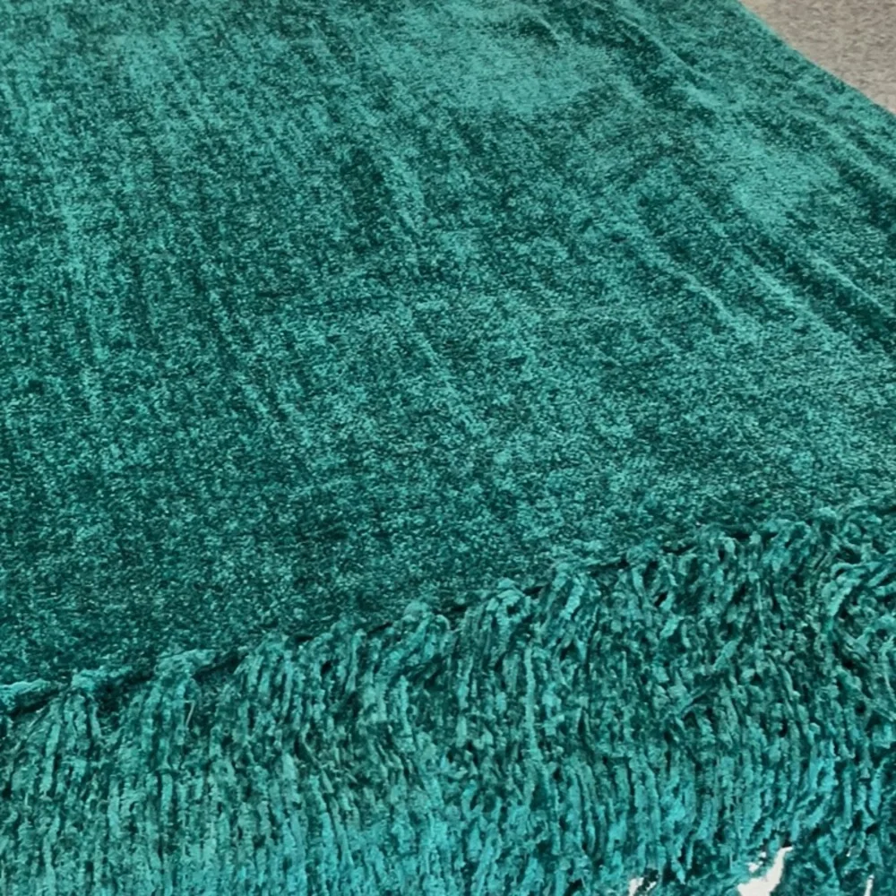 Pier 1 Imports fringed throw.
